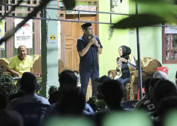 Kampanye di Desa Sintuwu Raya, Erwin Burase Minta Tim Solidkan Barisan